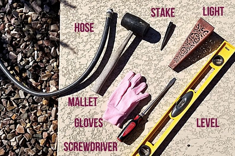 Hose mallet gloves screwdriver and level