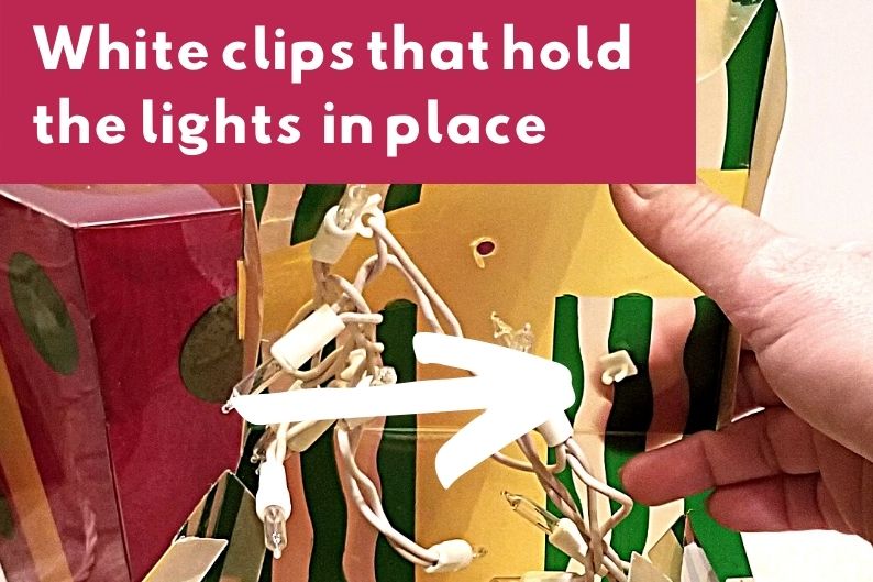 white clips that hold lights onto christmas decoration