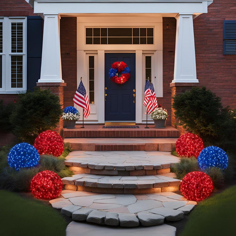 Blue and red solar lights on bushes lining walkway